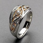 Skulpturel ring i guld og sølv