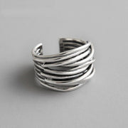 Justerbar ring i flere lag
