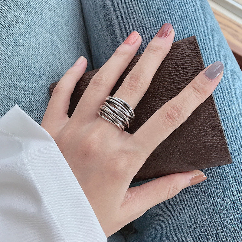 Justerbar ring i flere lag