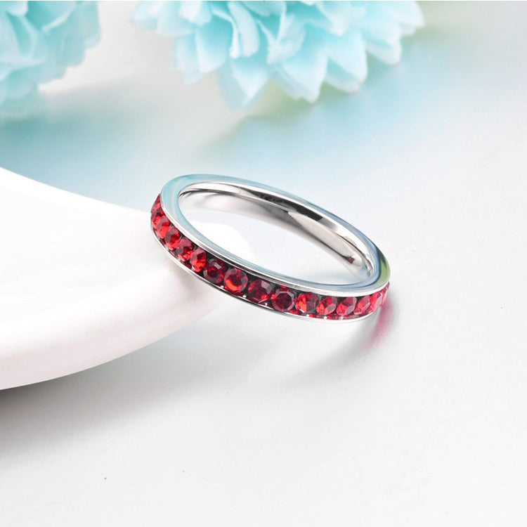 Infinity-ring med rubin | Hvidguld