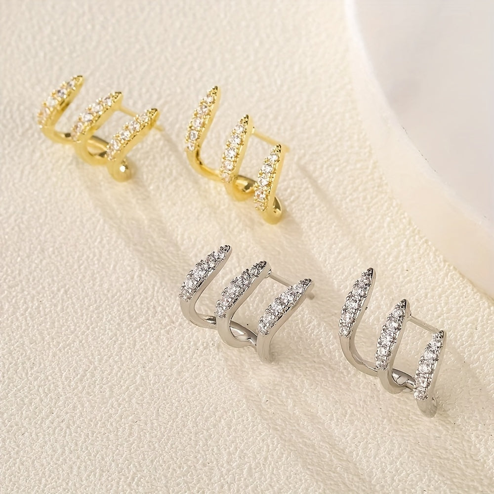 Elegante øreringe med strass i tre grebstakker