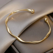 Elegant armbånd i guld