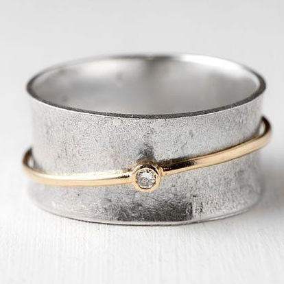 Elegant ring i guld og sølv
