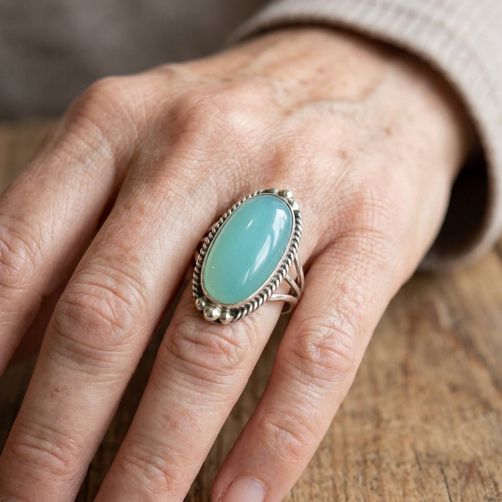 Noemi™ - Anello con Turchese e Fascia Intrecciata